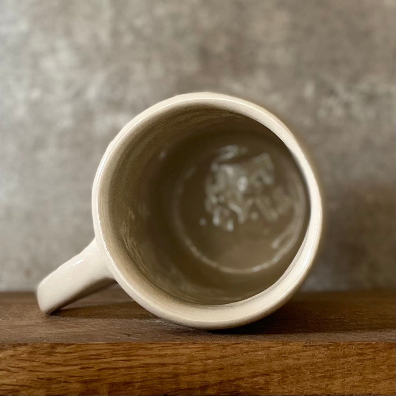 Ceramic mug with funny saying about money