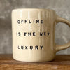 Beige mug OFFLINE IS LUXURY