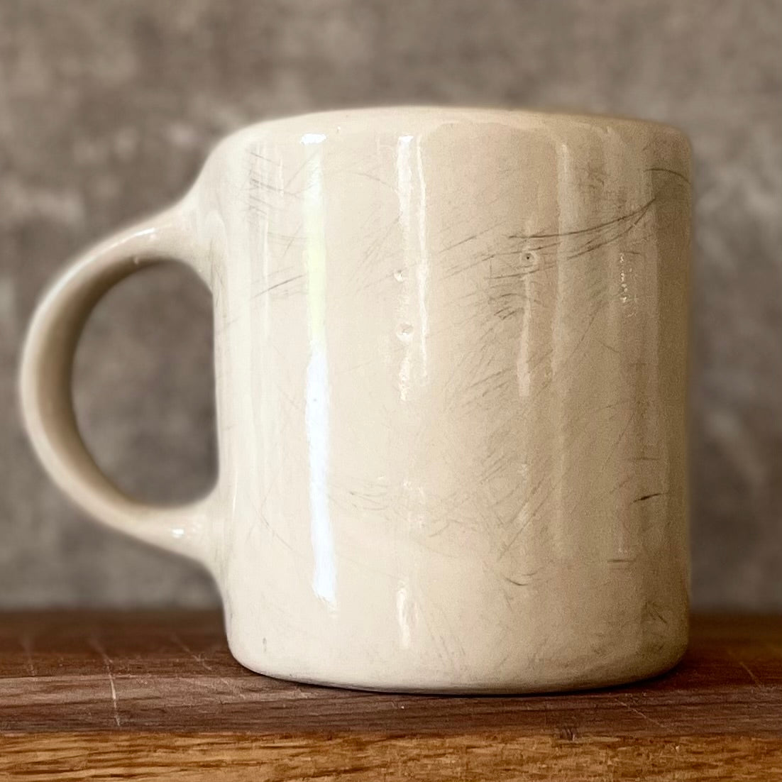 Ceramic mug with saying about balance with handle