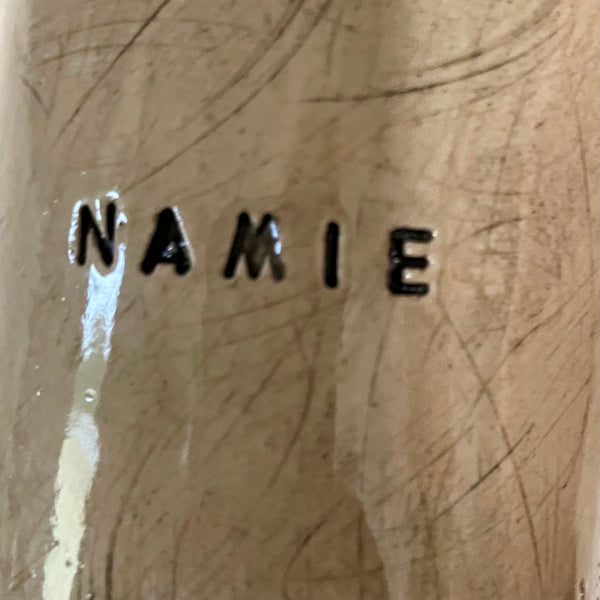 Beige mug with word in NAMIE