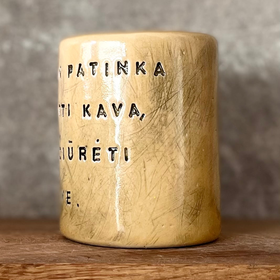 Yellow mug about coffee and you