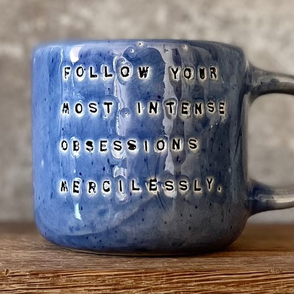 Blue coffee mug with quote by Kafka