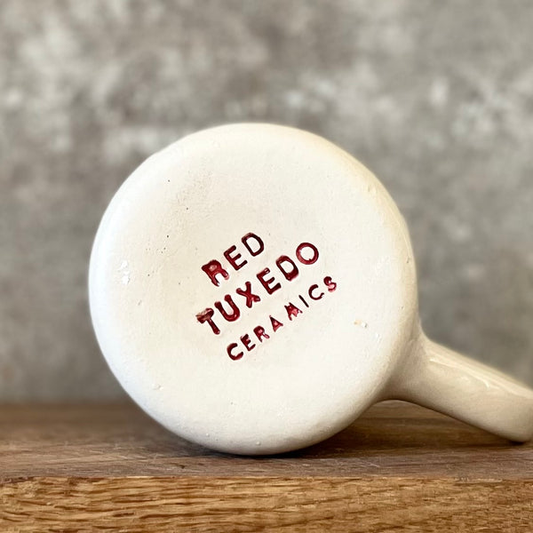 Ceramic mug with word LĖČIAU