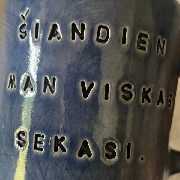 Mėlynas puodelis apie sėkmę