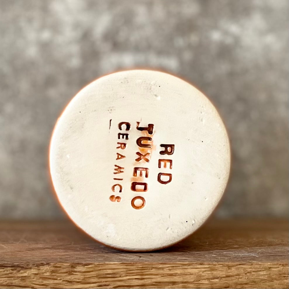 Bright orange mug about wishes