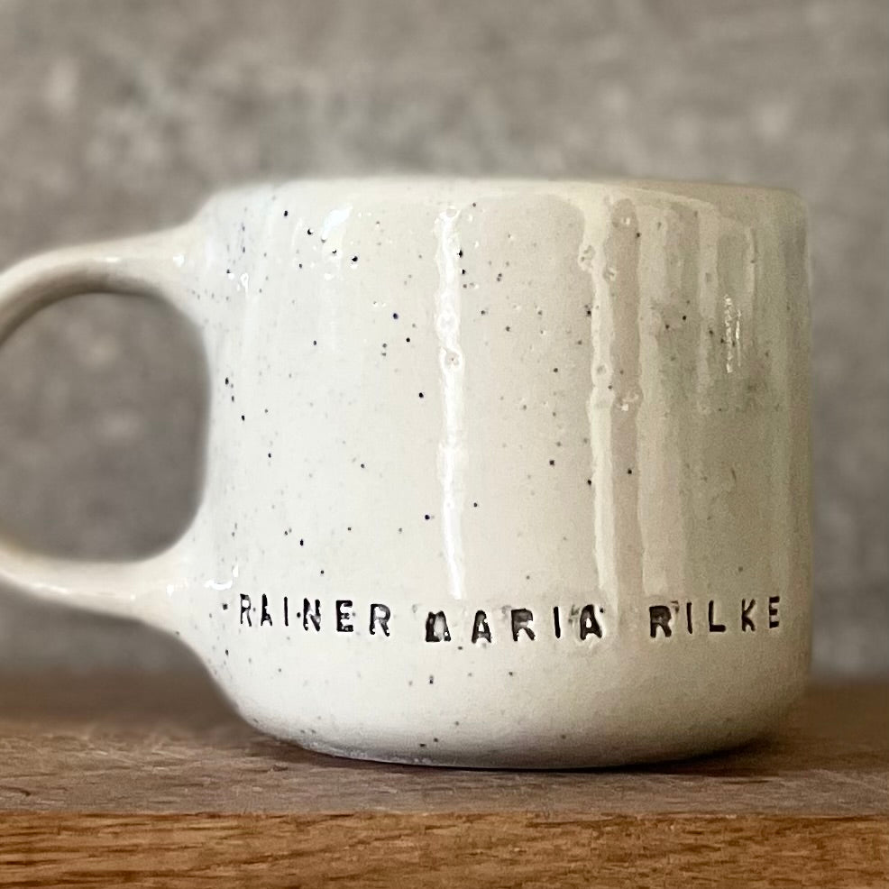 Ceramic mug with artist quote