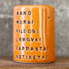 Bright orange mug about wishes