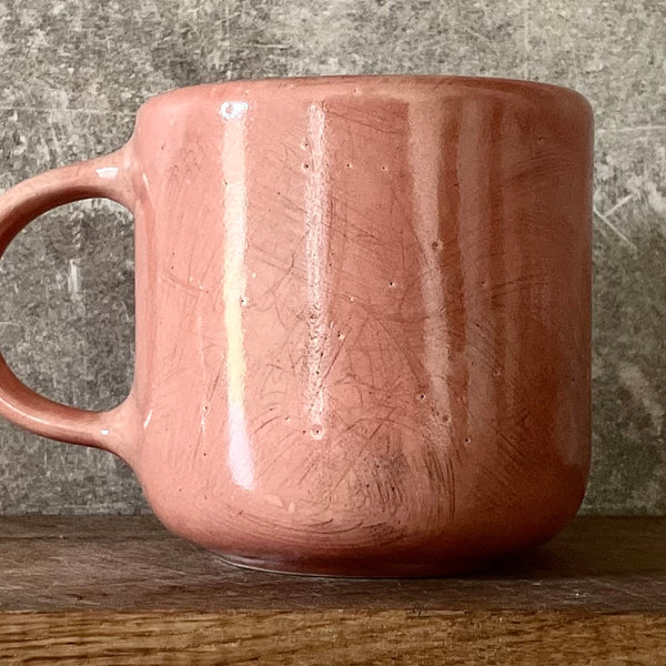 Big red mug with saying in Lithuanian