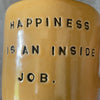 Yellow coffee mug with saying about happiness