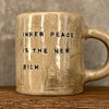 Beige large handmade ceramic mug with saying about peace