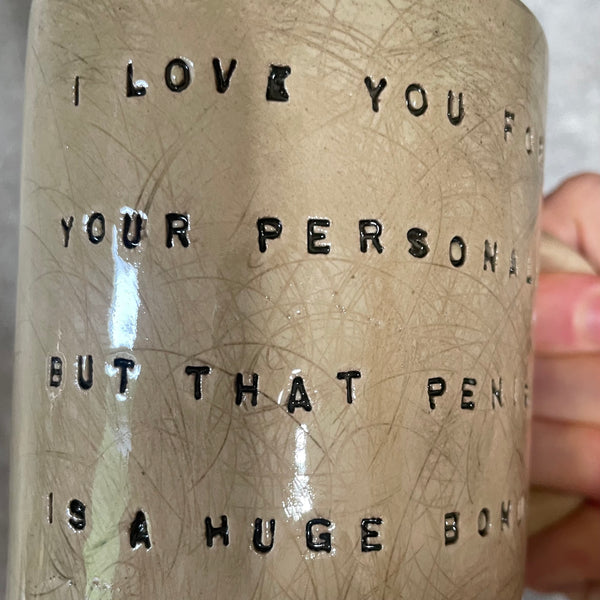 Brownish mug with funny saying