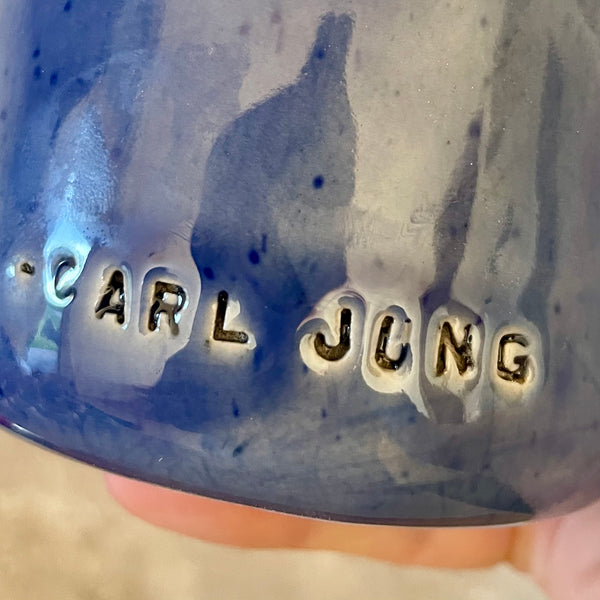 Blue tumbler mug with quote by C. Jung