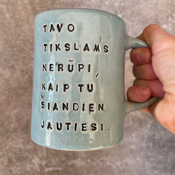 Blue mug with quote about goals