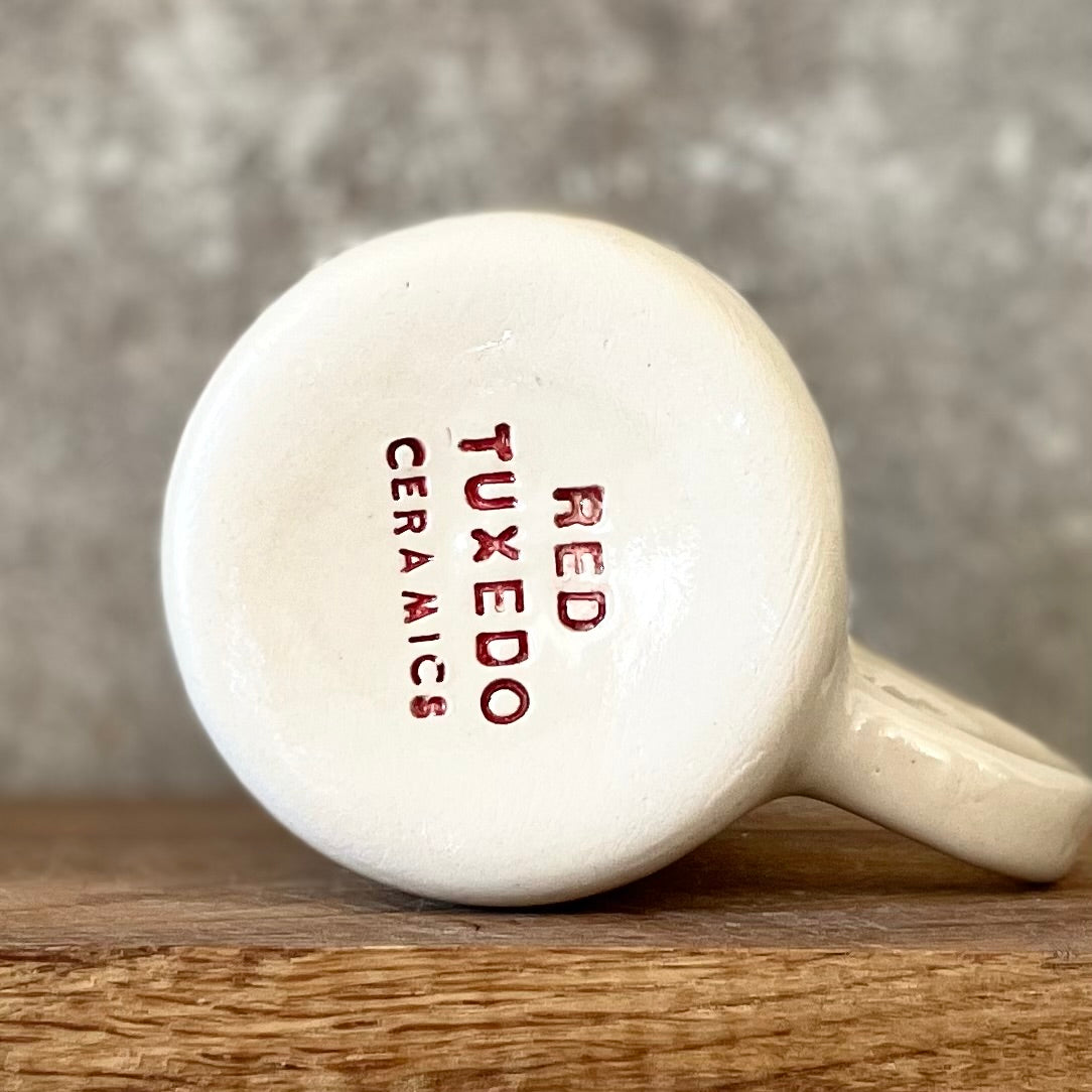 Ceramic mug with word in Lithuanian