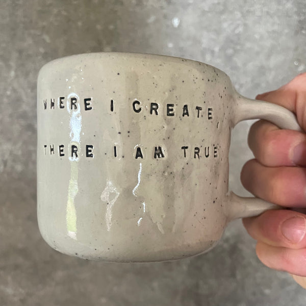 Ceramic mug with artist quote
