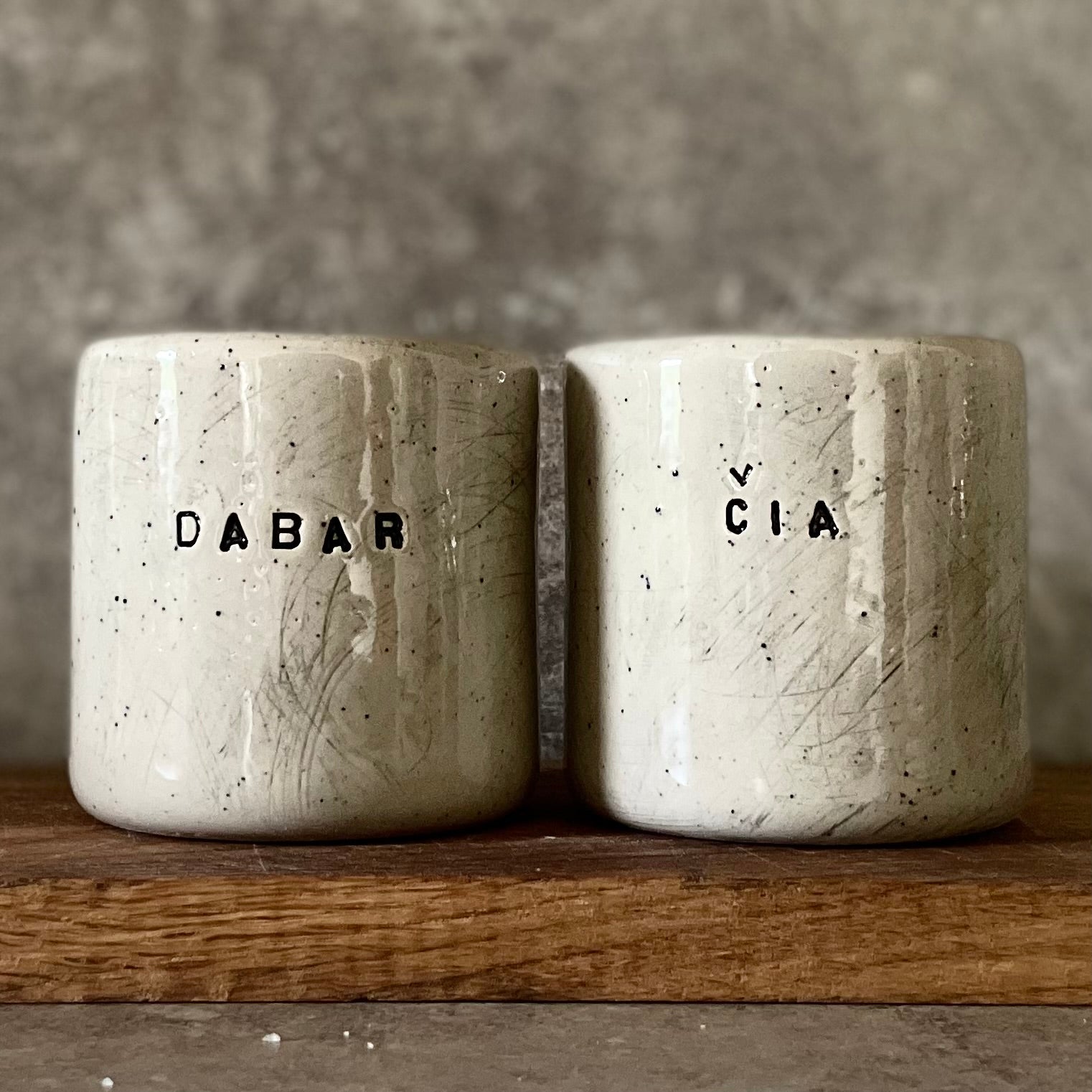 Speckled mugs DABAR and CIA