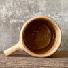 Brownish mug with good wishes