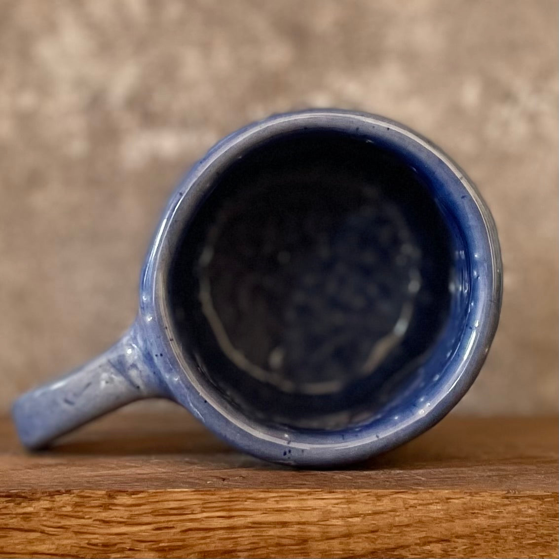 Blue coffee mug with quote by Kafka