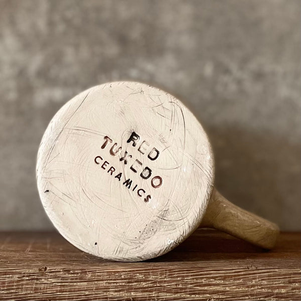 Brownish mug with funny saying