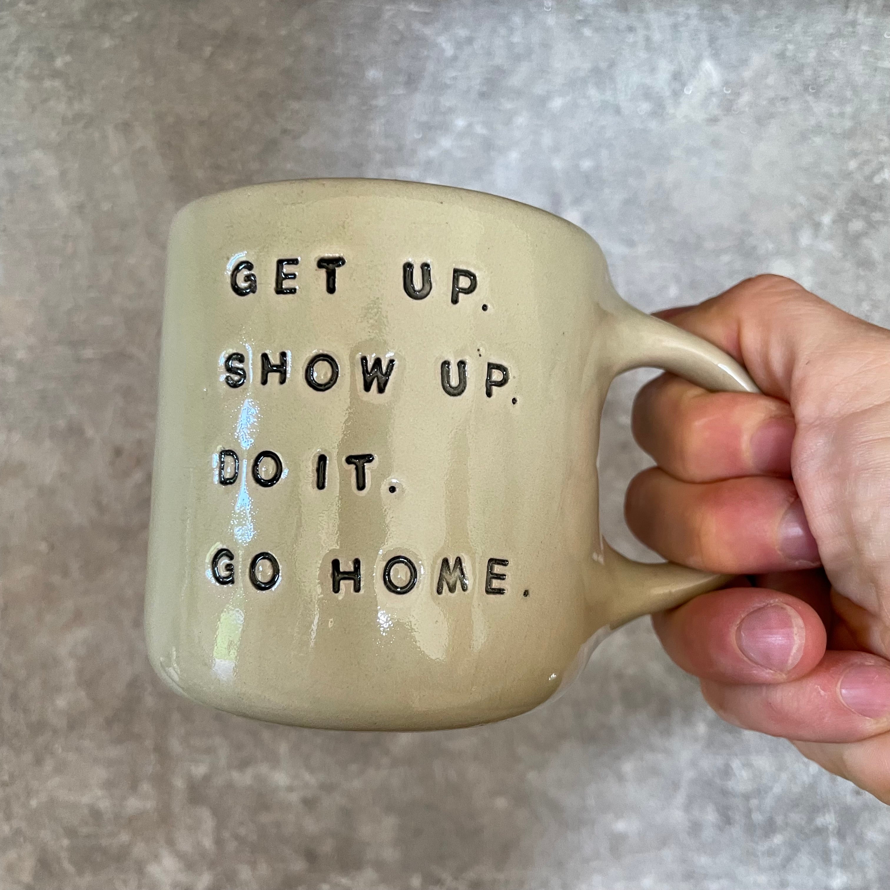 Beige mug with quote