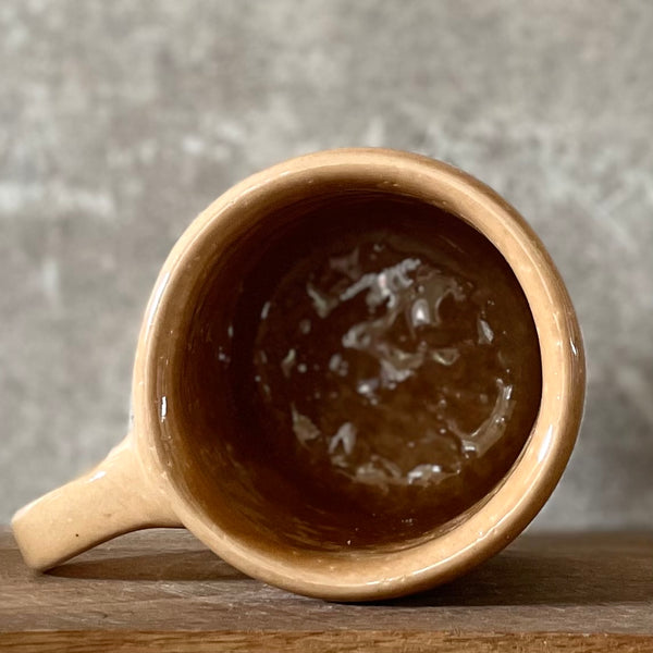 Caramel mug with words about work