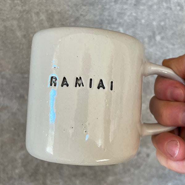 Ceramic mug with word in Lithuanian