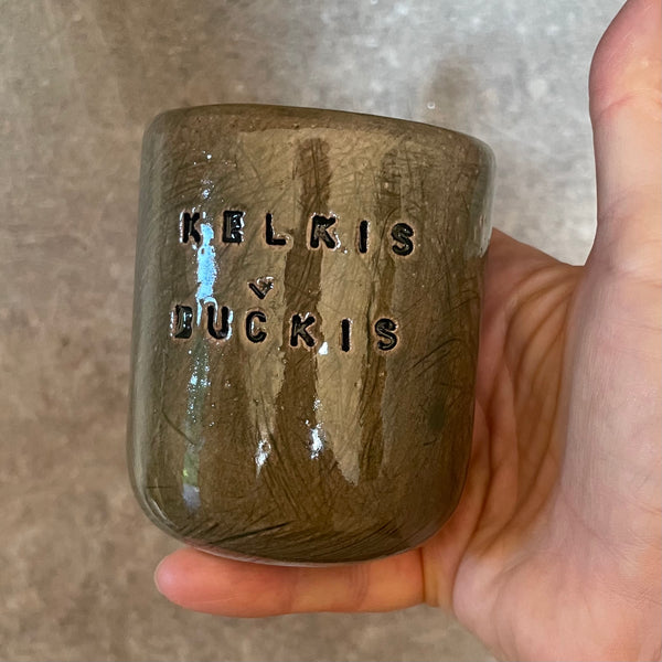 Dark green mug KELKIS BUČKIS