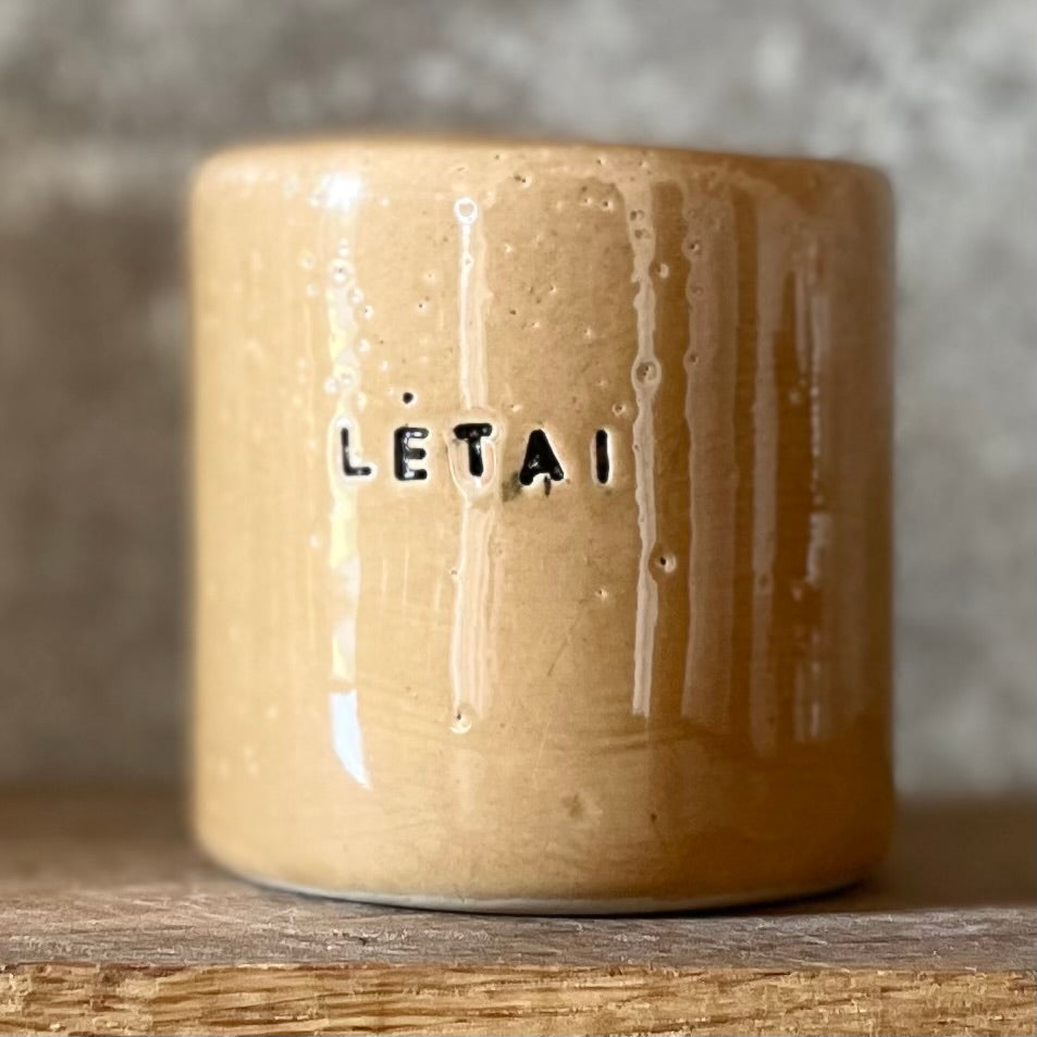 Caramel mug with word LĖTAI