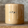 Caramel mug with word LĖTAI