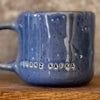 Blue coffee mug with quote by Kafka