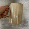 Beige mug with love saying in Lithuanian