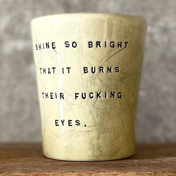 Bright yellow mug with saying