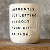 Ceramic coffee mug with saying about the flow
