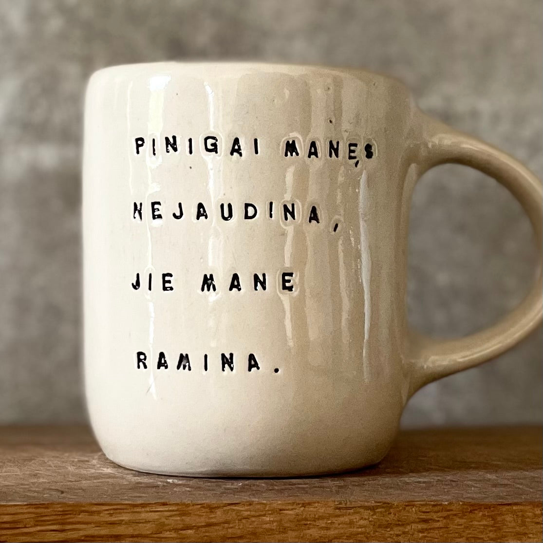 Ceramic mug with money saying