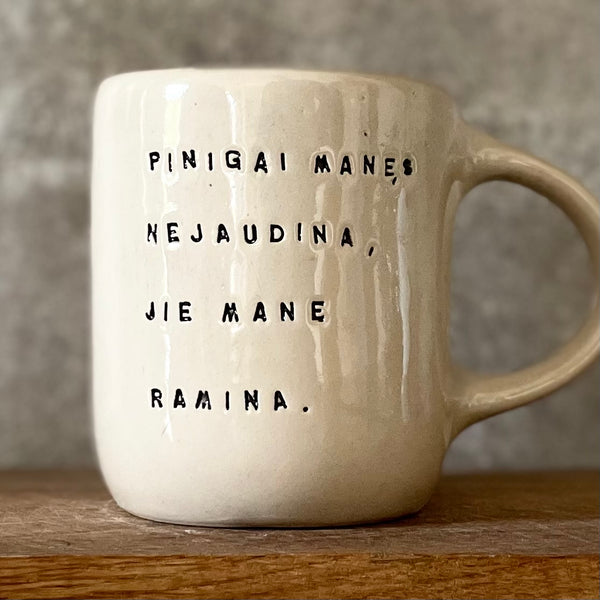 Ceramic mug with money saying