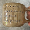Brown mug with quote by S. Freud
