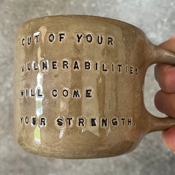 Brown mug with quote by S. Freud