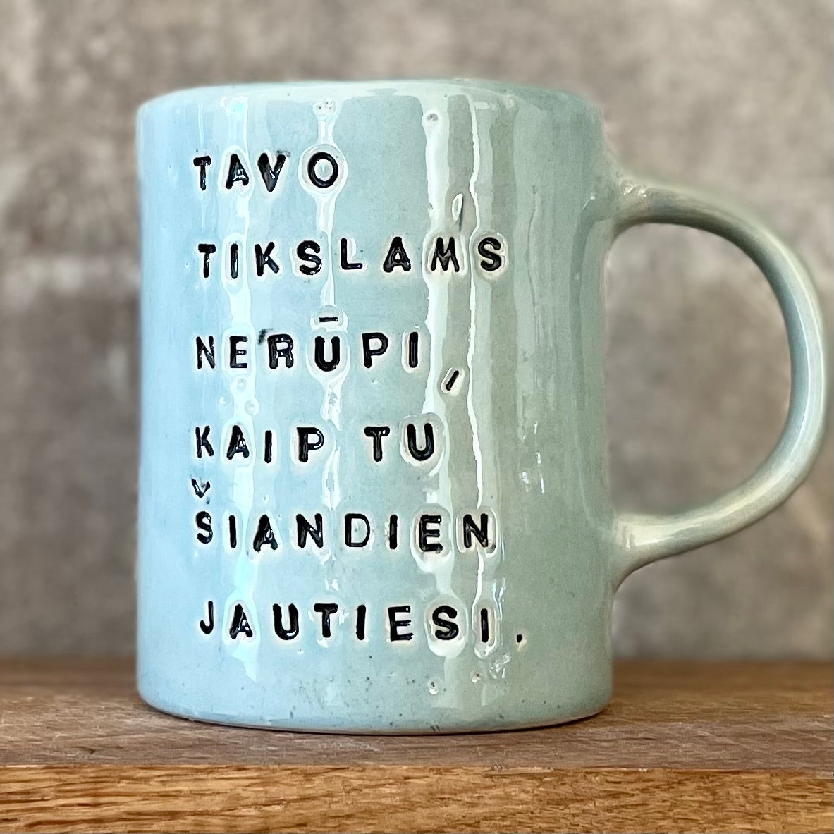 Blue mug with quote about goals