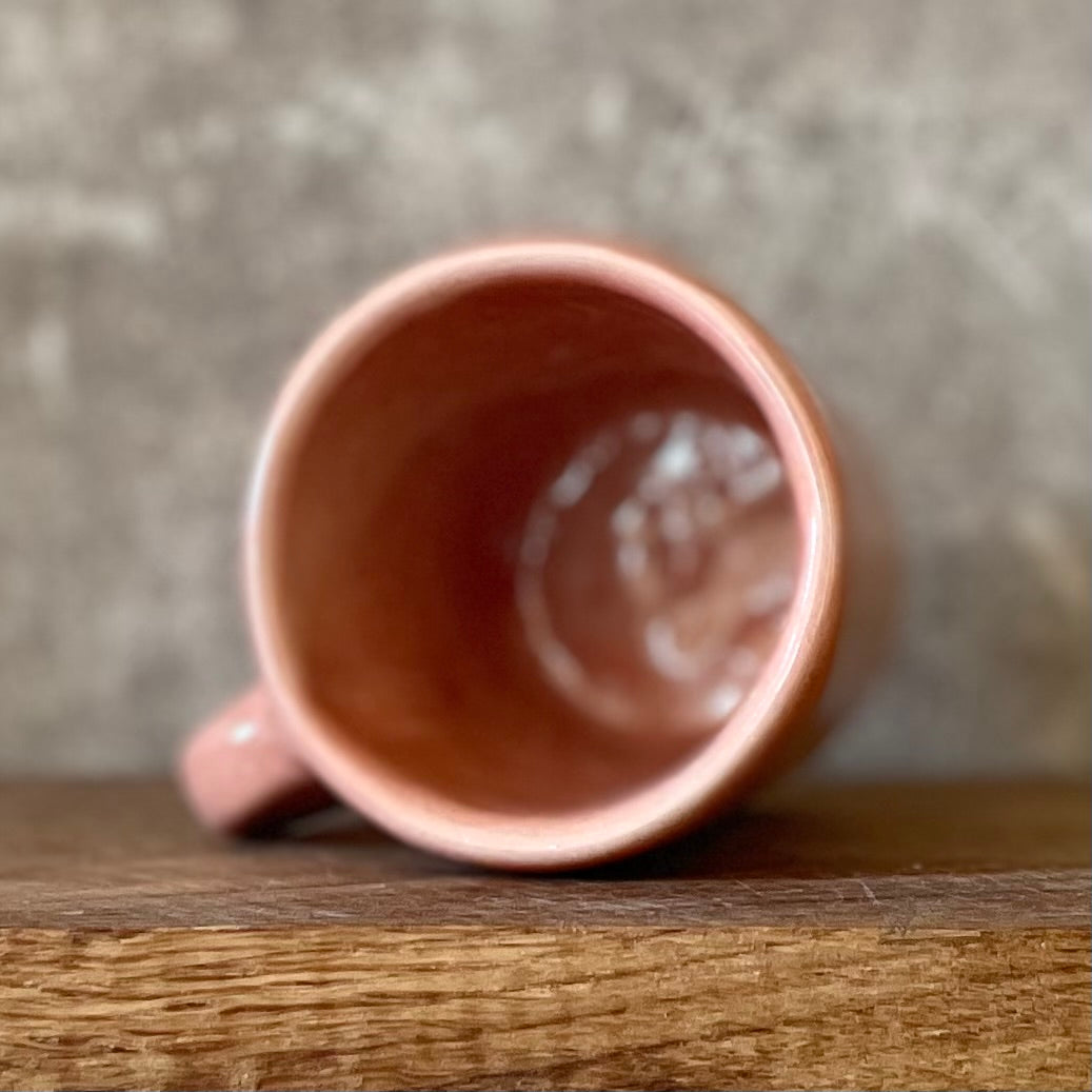 Mažas švelniai rožinis puodelis su mielu užrašu