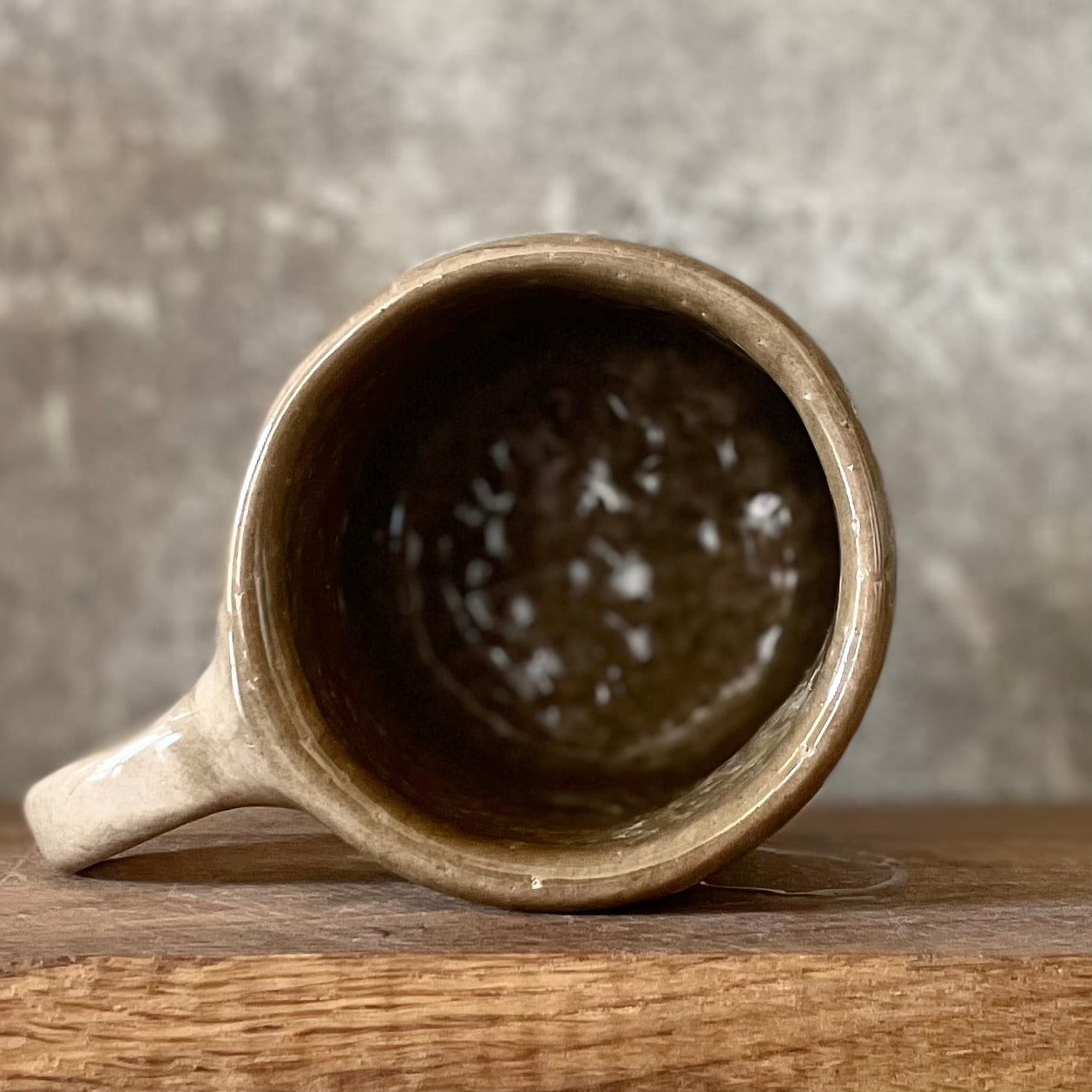 Brown mug with quote by S. Freud