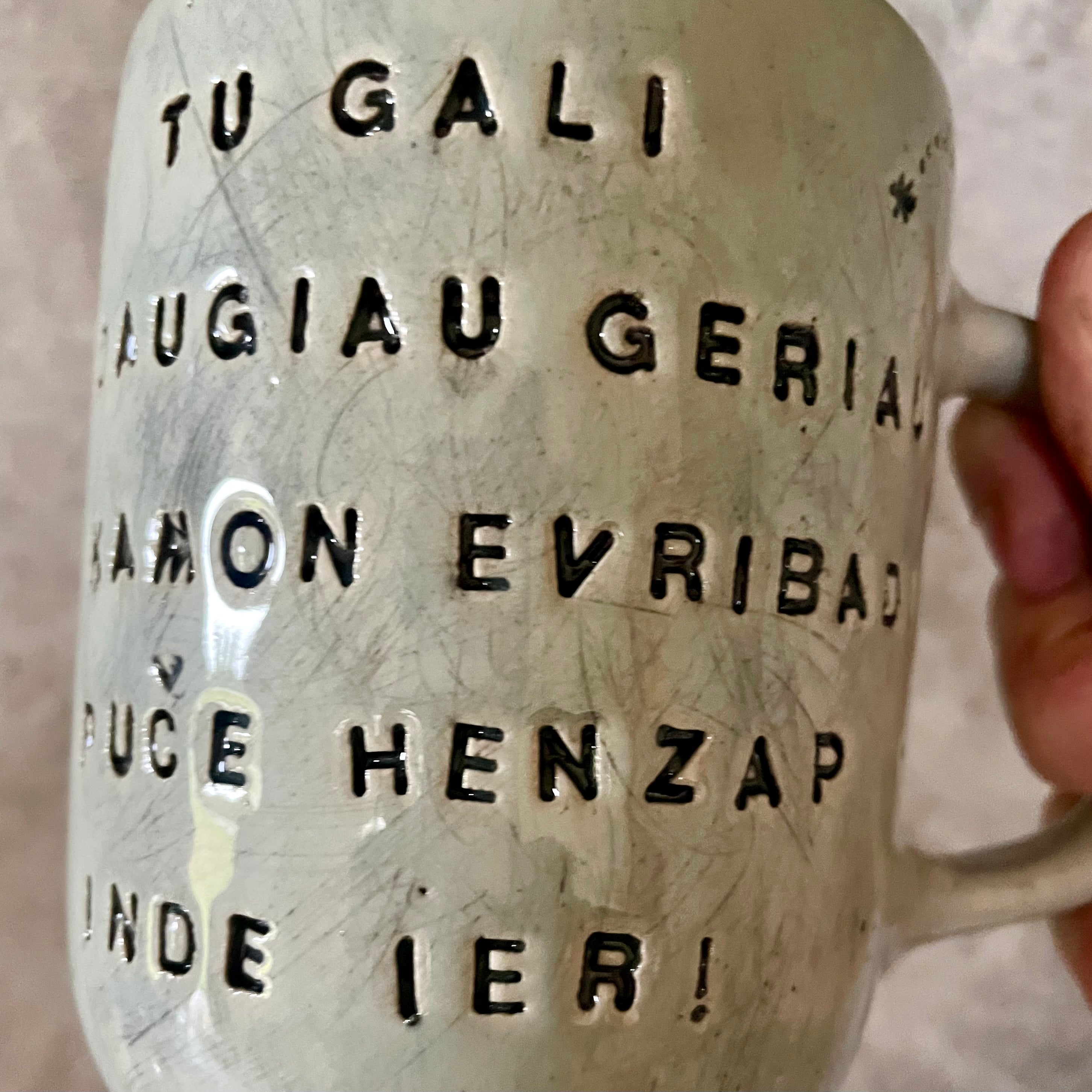 Blue mug with funny saying in mixed Lithuanian