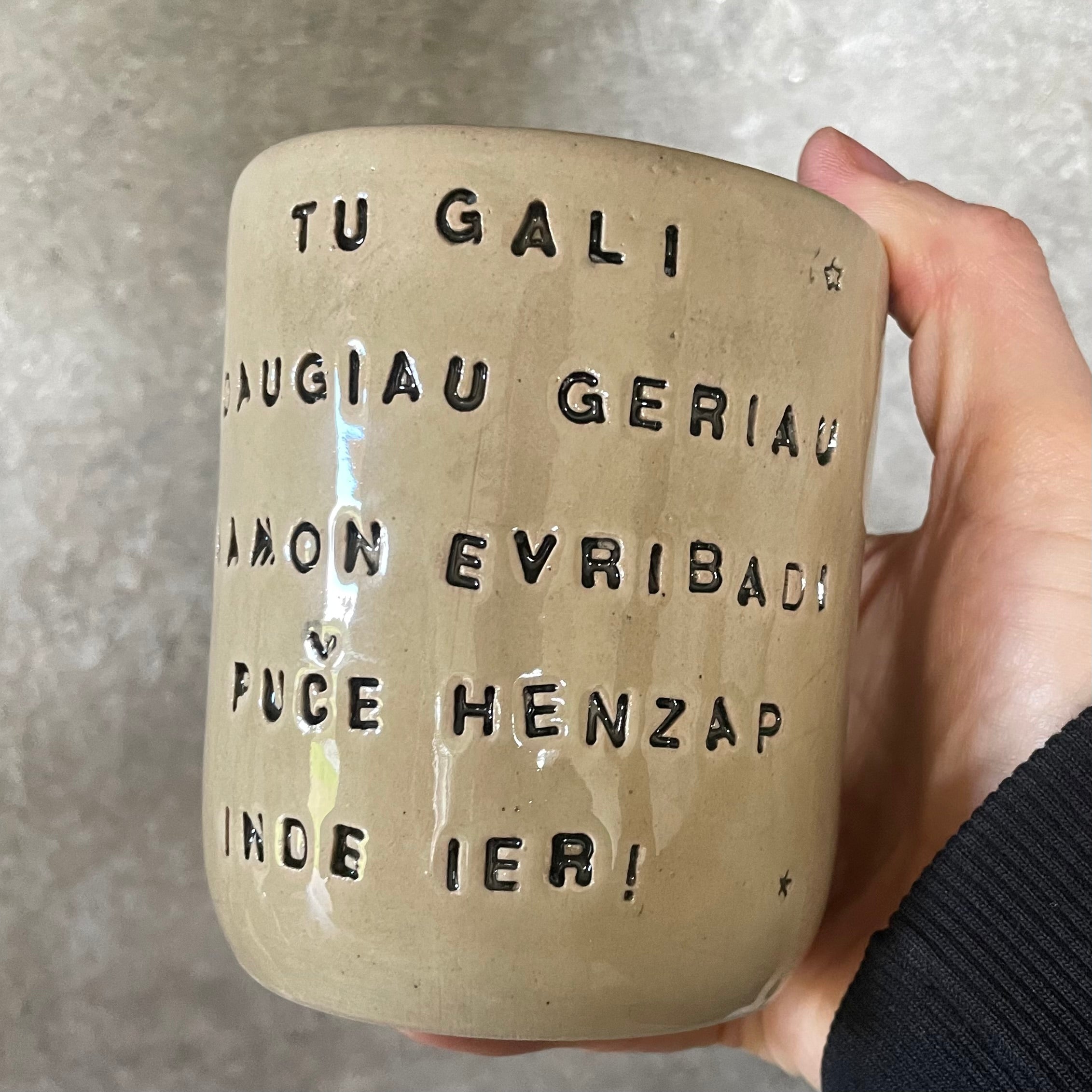 Beige mug with funny phrase in Lithuanian