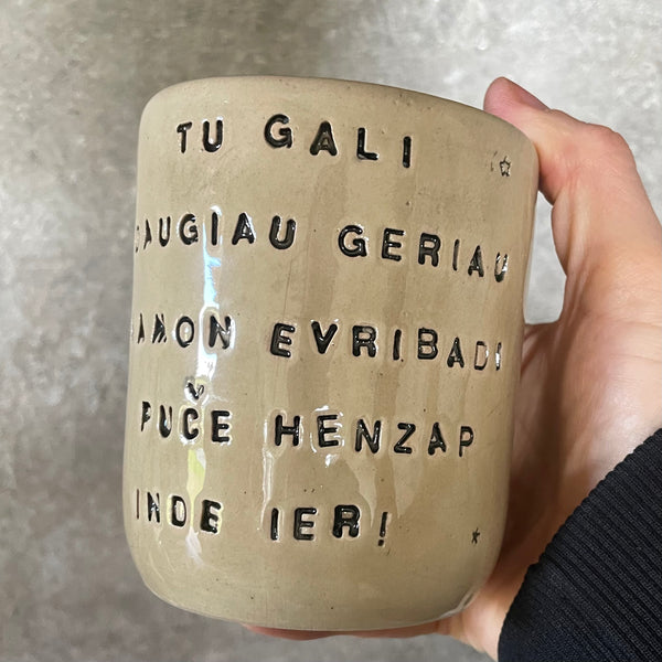 Beige mug with funny phrase in Lithuanian