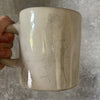 Big white ceramic mug about rest