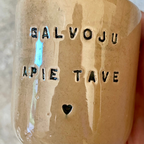 Brownish small mugs without handle with sentimental text