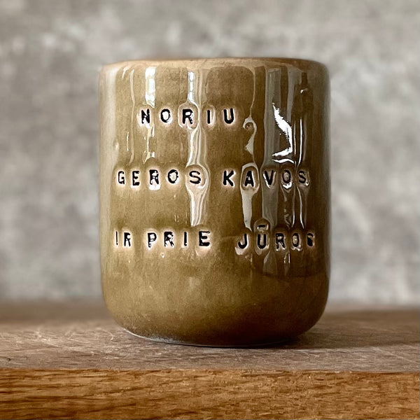 Brown small mug with phrase