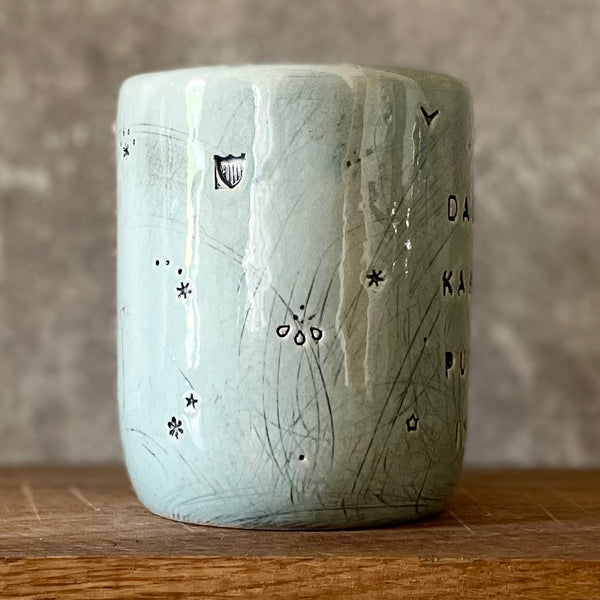 Blue mug with funny phrase in Lithuanian