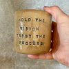 Bright yellow tumbler mug with inspirational words