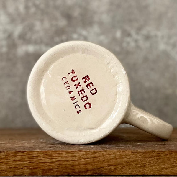 White coffee mug with saying