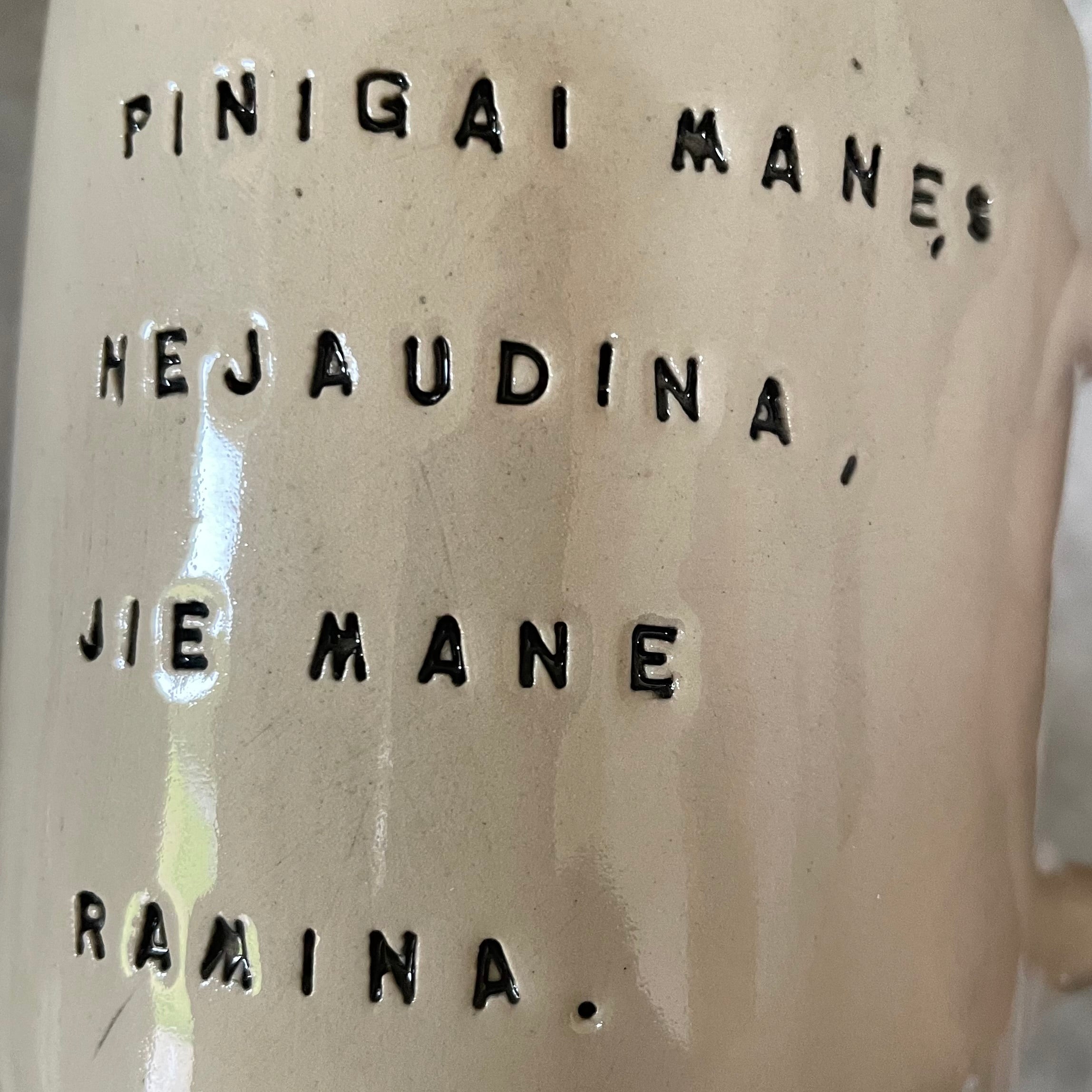 Ceramic mug with money saying